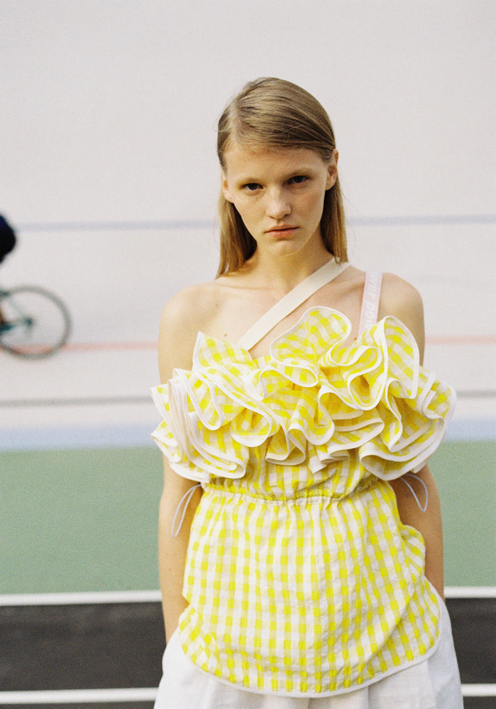 Top with ruffled basque